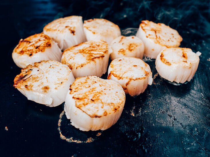 what is the reason why scallops are not placed directly on ice when storing